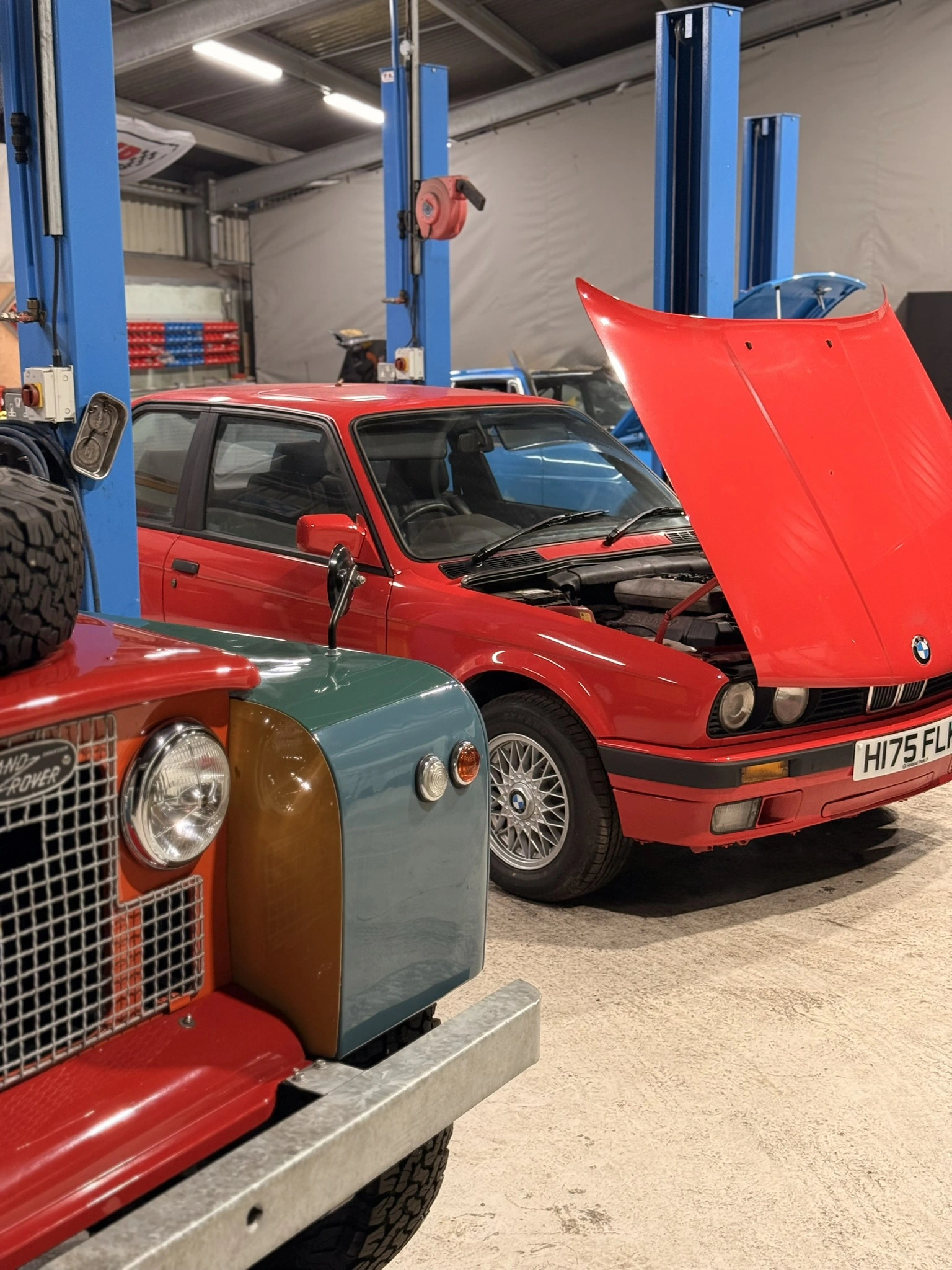 Workshop interior with classic cars